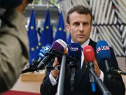 Macron says France past the covid peak